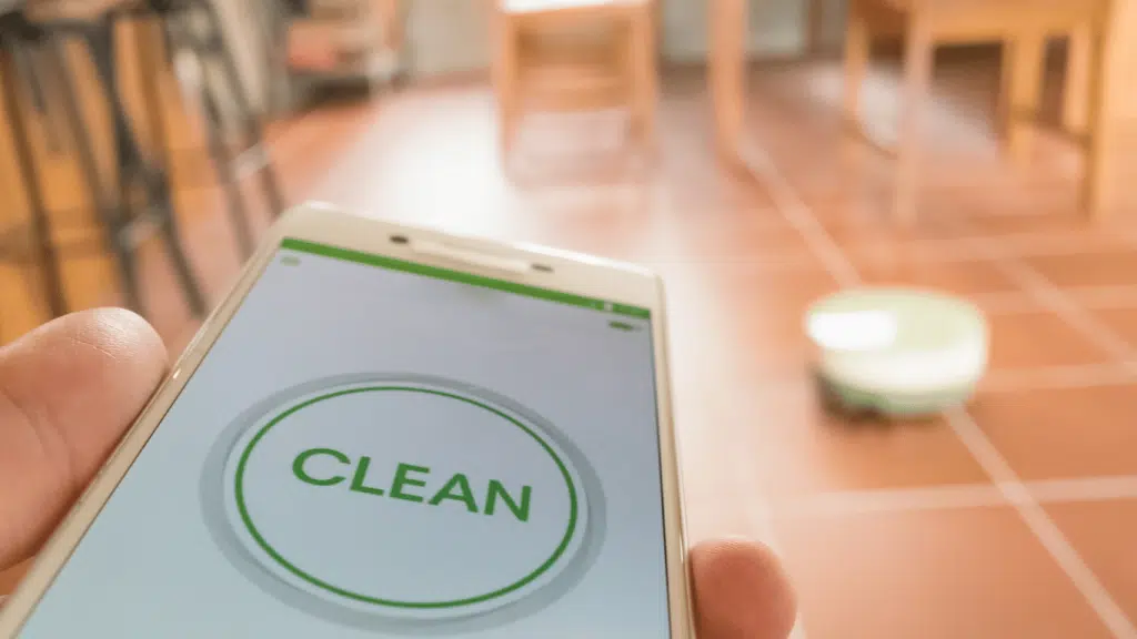An image of a mobile phone connecting via wi-fi to robot vacuum. 